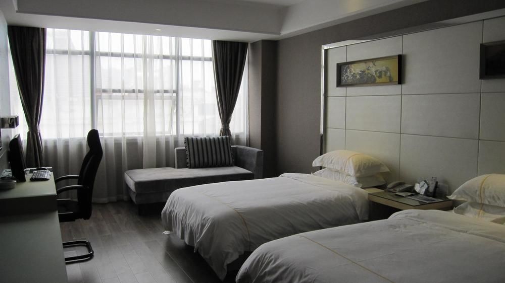 Sheng Jing Yi Jia Hotel Huji Esterno foto